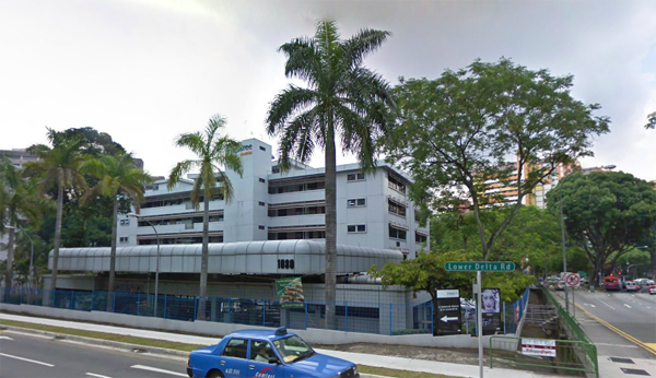 The building at 1092 Lower Delta Road seen from the main road, with the Lower Delta Road street sign in view